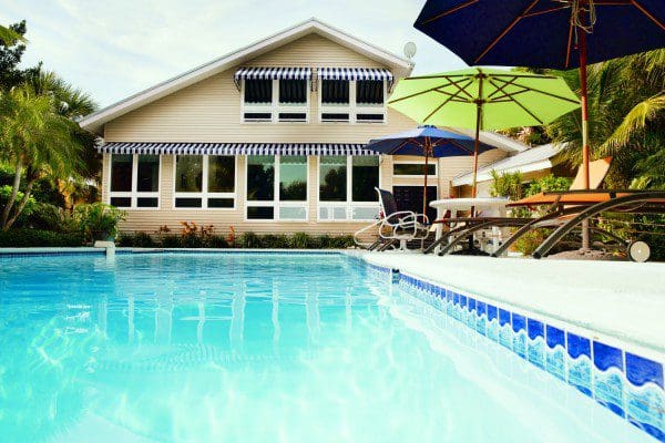 Awning windows by backyard pool — Central Florida